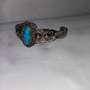 Turquoise and silver bracelet.